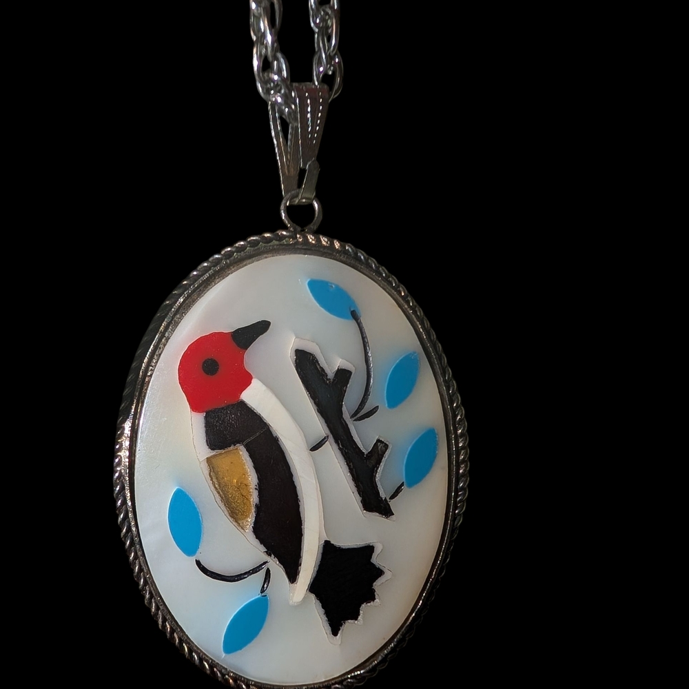 Bird Pendant Necklace with Red and Blue Accents